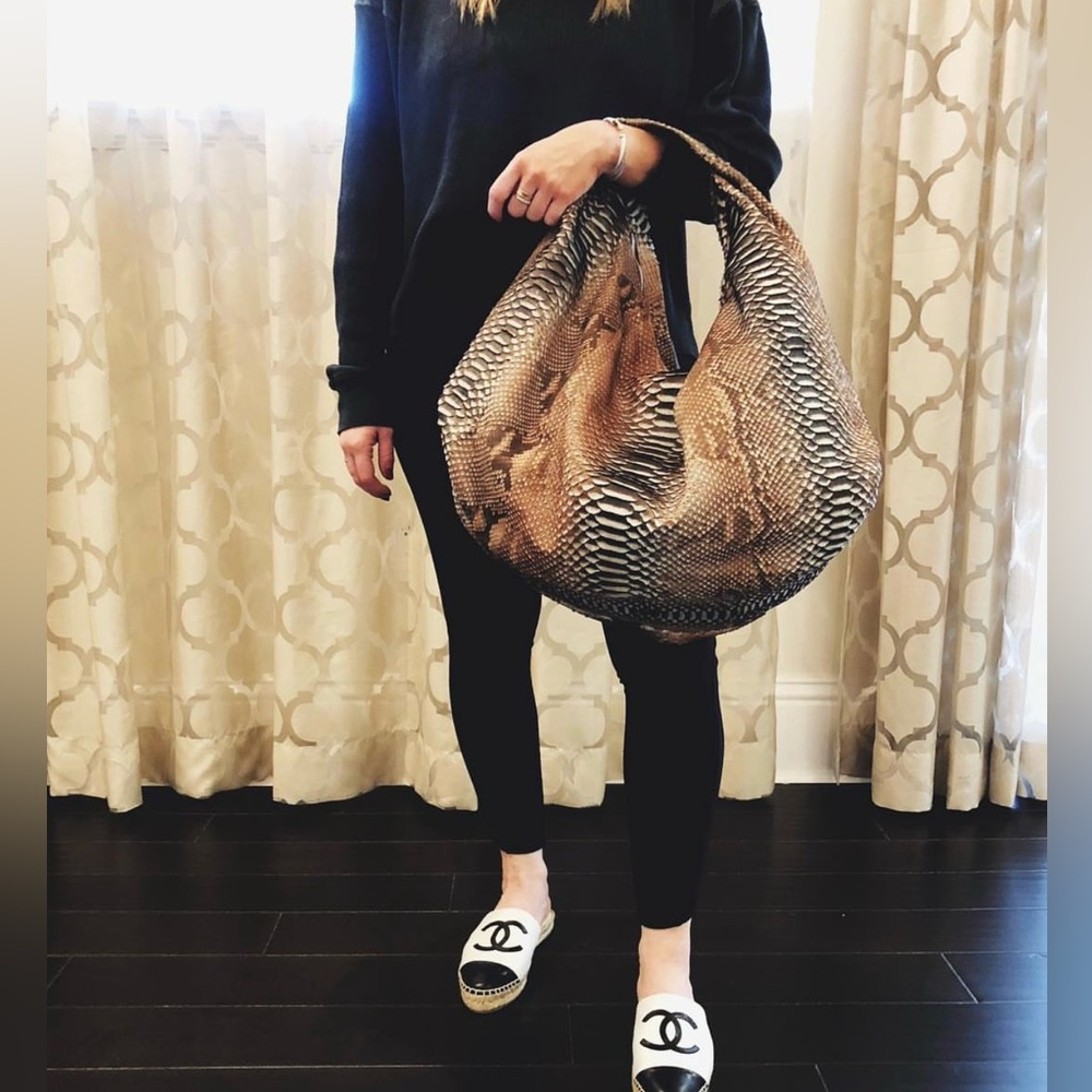 Python hobo bag by Justified Hunt.